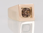 Yellow gold ring with smokey quartz gem.