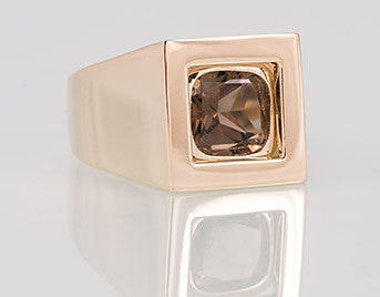 Yellow gold ring with smokey quartz gem.
