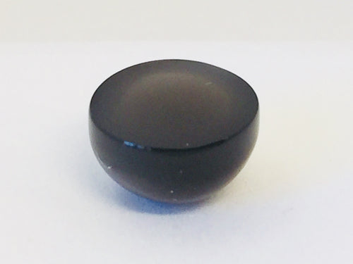 Large round charcoal grey moonstone gem, white background.