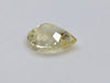 Medium pear-shaped yellow sapphire gem, white background.