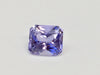 Violet purple sapphire gem, white background.