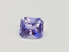 Violet purple sapphire gem, white background.