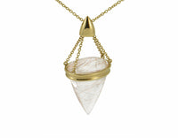 Very large pendant in yellow gold with large clear gem with golden needles inside. On gold chain.