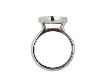 White gold ring, round face, small pink, orange, reddish gems scattered in the face.
