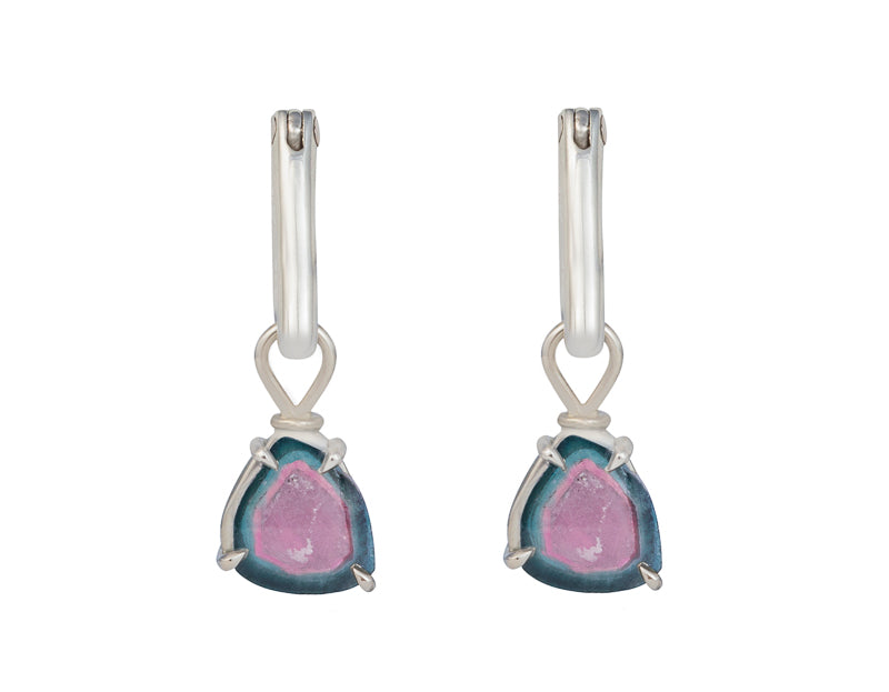 Small triangle shaped gems pink centre, denim blue rims set in white gold. Drops hang on small U shaped hoops in solid white gold.