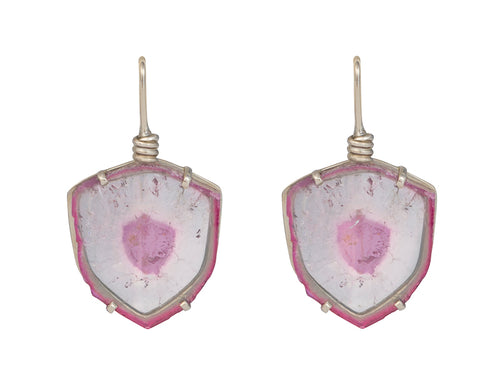 Shield shaped slices of gems with pink rims and pink centre and light grey, set in white gold.