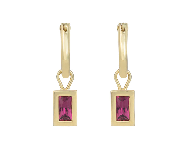 Small rectangle bright raspberry red gems in green gold frame. Drops hang from small U shaped hoops in green gold.
