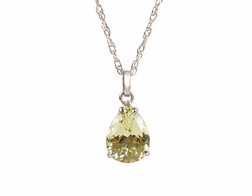 Platinum pendant with pear shaped Chrysoberyl gem showing flashes of green, yellow, gold.