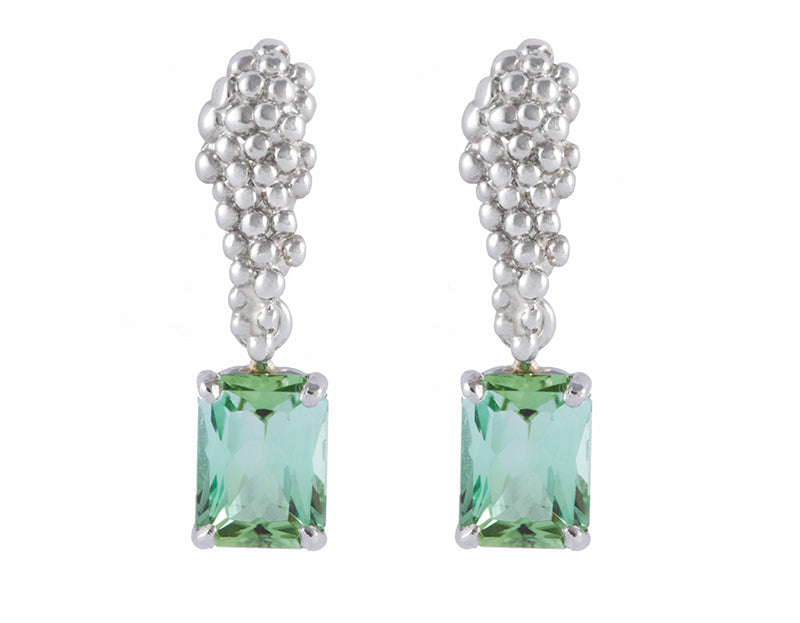 Platinum studs in shape of a bunch of grapes, with green rectangular gems hanging from bottom.