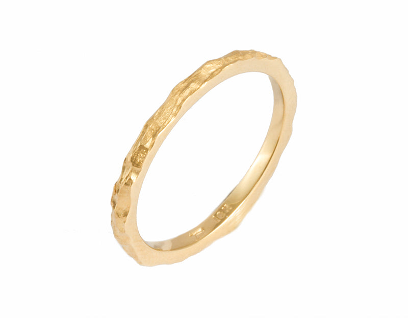 Thin yellow gold band with a bark-like texture.
