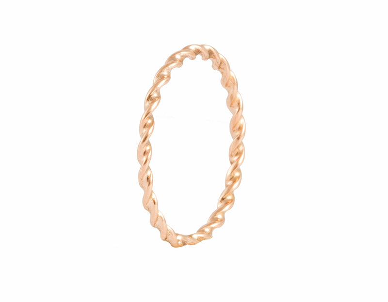 Delicate thin band in rose 18 karat gold that looks like two wires twisted together.