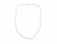 Strand of pale silver blue pearls. Clasp is shaped like bunches of grapes in platinum.