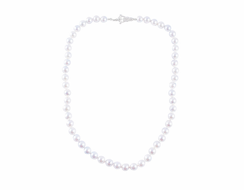 Strand of pale silver blue pearls. Clasp is shaped like bunches of grapes in platinum.