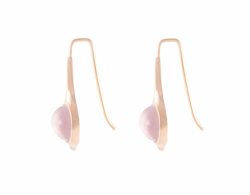 Rose gold drop earrings with oval shaped pink smooth gems.