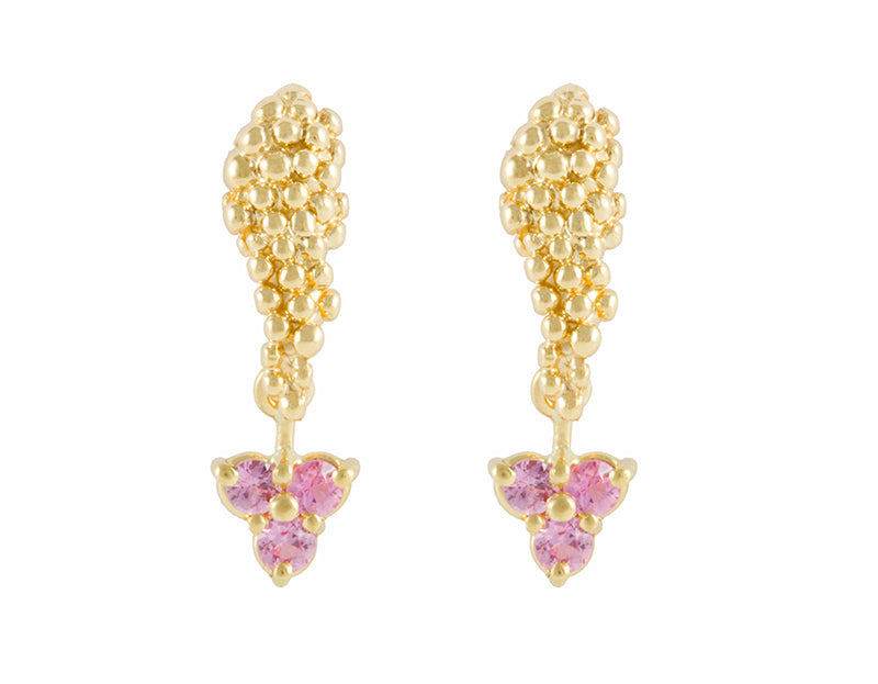 Studs in yellow gold in the shape of bunches of grapes. Three soft pink gems hanging from each.