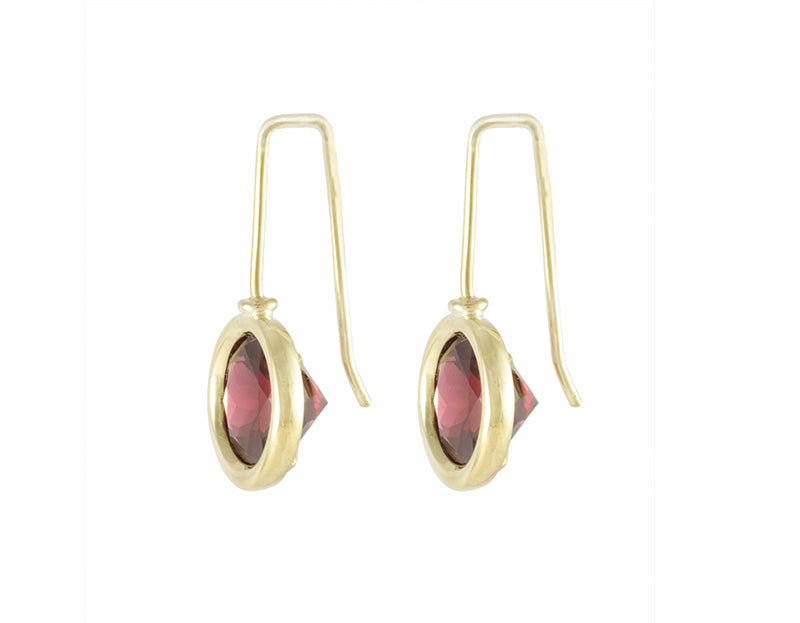 raspberry coloured rhodolite garnets set in 18k green gold