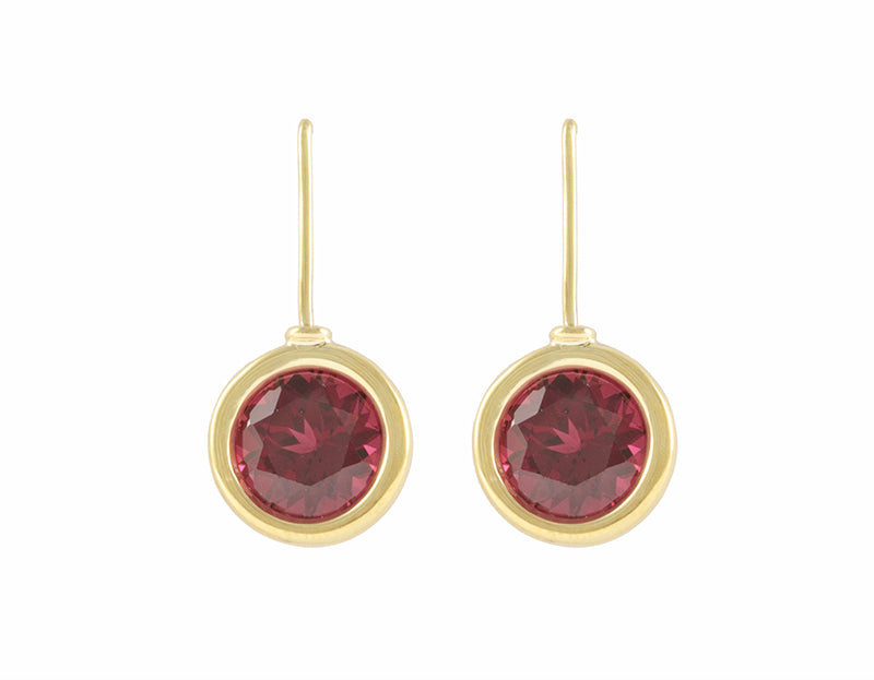 raspberry coloured rhodolite garnets set in 18k green gold