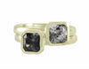 grey tourmalines in two 18k green gold rings