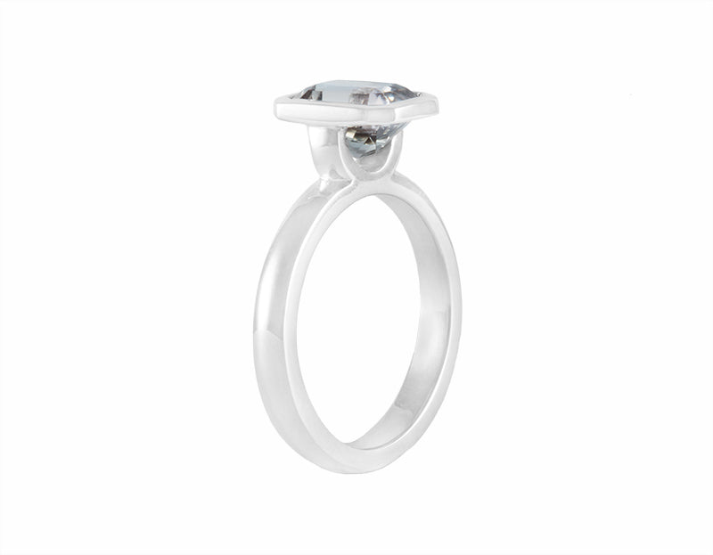 Grey tourmaline in platinum ring.