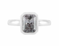 Grey tourmaline in platinum ring.