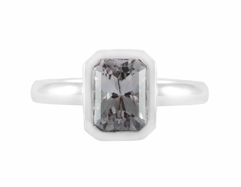 Grey tourmaline in platinum ring.