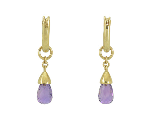 Pendulous drops with bright purple pear-shape gems in yellow gold frame. Drops hang on small U shaped hoops in solid yellow gold.