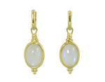 Large oval drops with white moonstone  cabochon gems in green gold frame. Drops hang on small U shaped hoops in solid green gold.