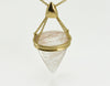 Very large pear shaped gem clear white with golden threads, intricate gold cap and chain.
