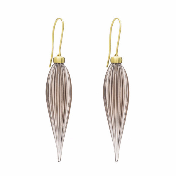 Very long pear shaped brown gems, fluted sides, green gold cap and shepherd's hooks.