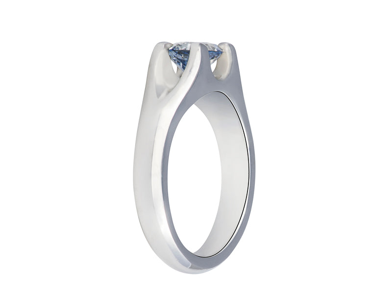 Platinum ring set with bi-colour sapphire, pastel blue and yellow.  Gem is set in substantial prongs.