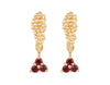 Pair of yellow gold studs in the shape of a bunch of grapes carved in detail in relief. Hanging from the bottom are trios of round red rubies forming a triangle.
