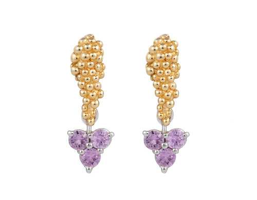 Pair of platinum studs in the shape of a bunch of grapes carved in detail in relief. Hanging from the bottom are trios of round pastel pink sapphires forming a triangle.