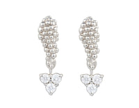 Pair of platinum studs in the shape of a bunch of grapes carved in detail in relief. Hanging from the bottom are trios of round diamonds forming a triangle.