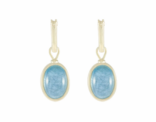 Natural aquamarine oval cabochons on 18k green  gold hoops.