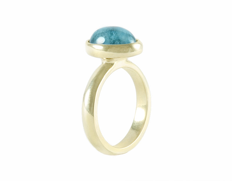 Aquamarine cabochon ring in 18k green gold.