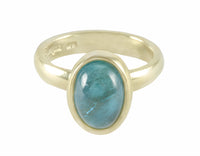 Aquamarine cabochon in 18k green gold ring.