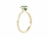Blue-green tourmaline in 18k green gold ring.