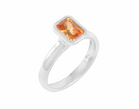 Orange Spessartite garnet in platinum ring
