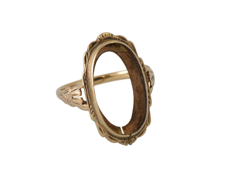 Old ring, gem removed.