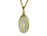 Green gold pendant set with large oval green moonstone and diamond clasp on green gold chain..