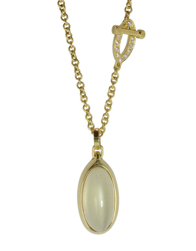Green gold pendant set with large oval green moonstone and diamond clasp on green gold chain..
