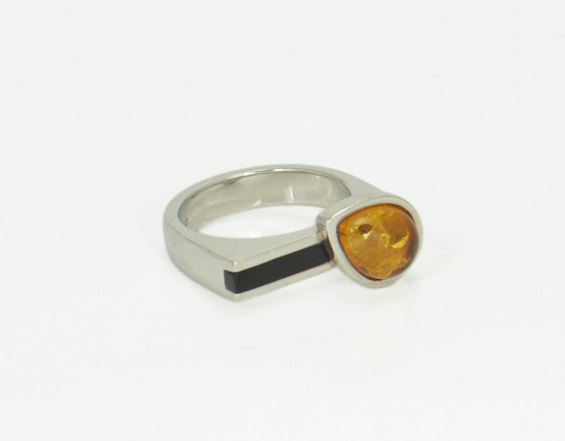 Amber and onyx ring in platinum.
