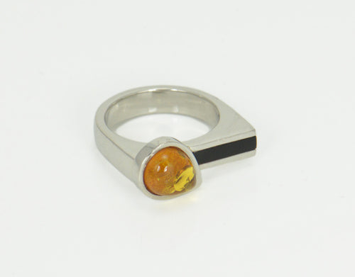 Amber and onyx ring in platinum.