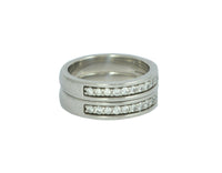 White gold matching bands with diamonds.