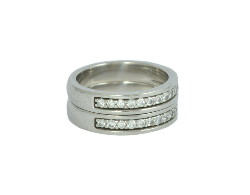 White gold matching bands with diamonds.