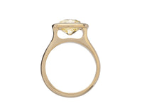 Large yellow diamond in yellow gold ring.