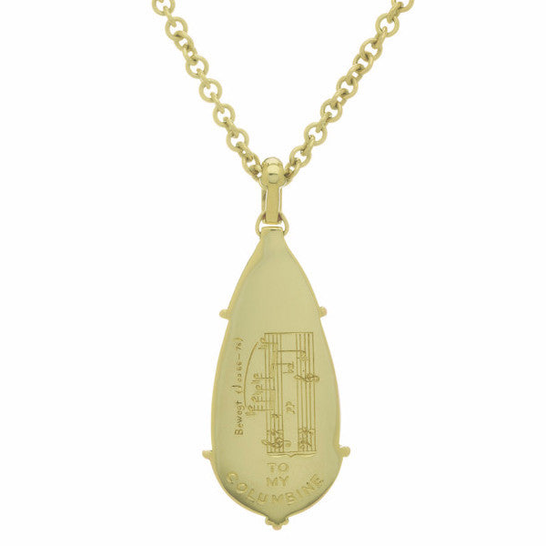 Large white teardrop moonstone pendant in green gold with Pierrot Lunaire engraving, on green gold chain.