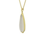 Large white teardrop moonstone pendant in green gold with Pierrot Lunaire engraving, on green gold chain.