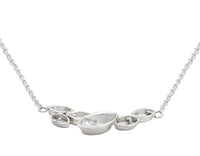 White gold pendant, leaf motif, with diamonds.