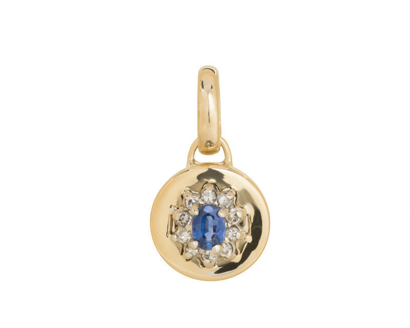 Pendant in yellow gold with blue sapphire.